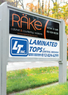 Campus signage showing both R&auml;ke Cabinet & Countertop Solutions and Laminated Tops of Central Indiana